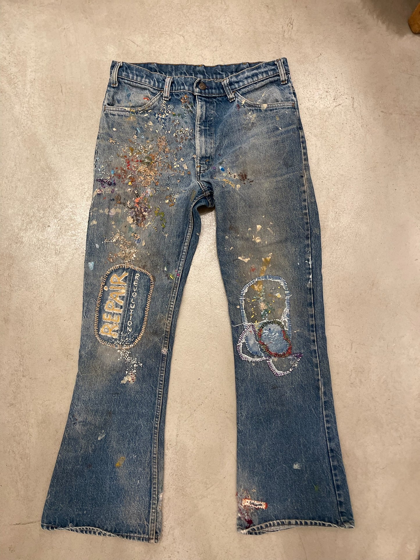 “Repair Revolution” Embellished Orange Tab Levi’s