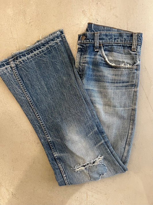 Vintage Levi’s Orange Tab Patched Jeans